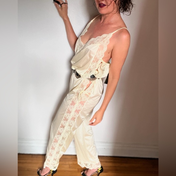 Lingerie jumpsuit made of nylon and lace with cute ties on the side. Open size. - Picture 10 of 14